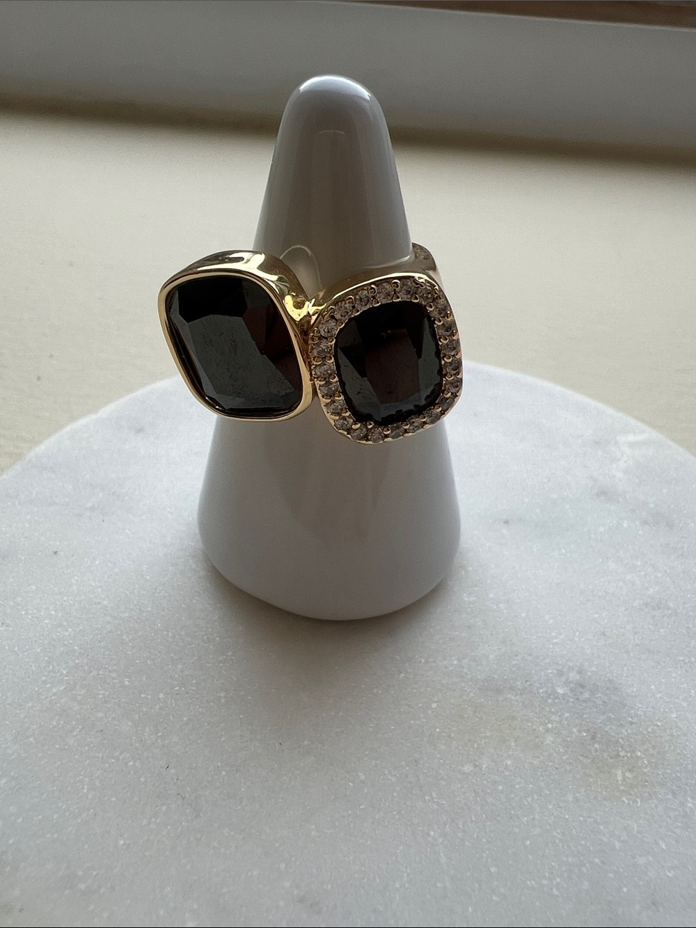 bp Gold-Tone Ring with Black Faceted Stones and Crystal Halo